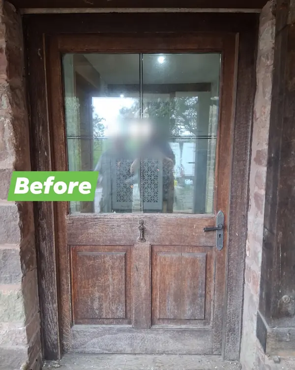 Before: a weathered old oak door with a glazed top half, in a stone doorway